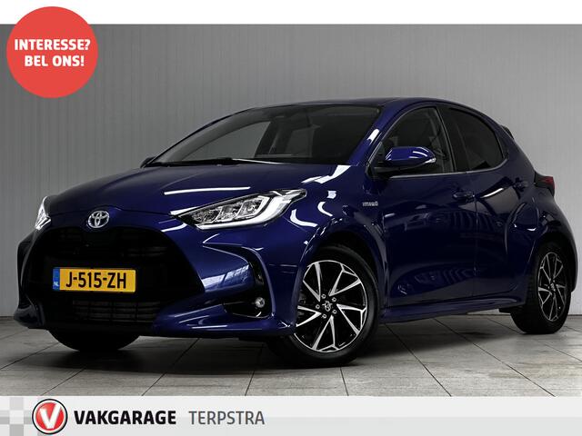 Toyota YARIS 1.5 Hybrid Dynamic/ NIEUW MODEL!/ Dealer Onderhouden!/ Trekhaak!/ Automaat/ LED Koplampen/ Apple+Android/ DAB+/ 16''LMV/ Grootlichtass./ Camera/ Clima/ Navi/ Cruise/ Bluetooth/ Multi.LEDER.Stuur/ Isofix/ Getint