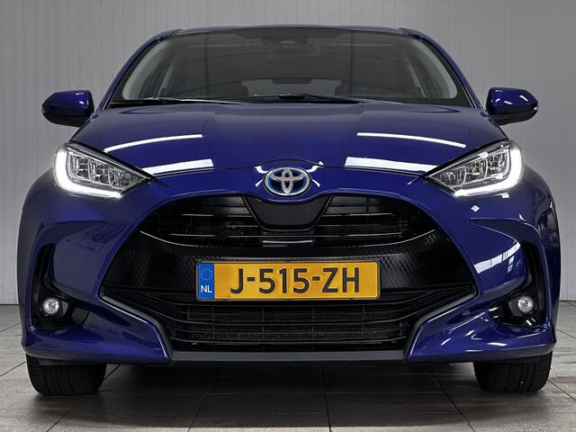 Toyota YARIS 1.5 Hybrid Dynamic/ NIEUW MODEL!/ Dealer Onderhouden!/ Trekhaak!/ Automaat/ LED Koplampen/ Apple+Android/ DAB+/ 16''LMV/ Grootlichtass./ Camera/ Clima/ Navi/ Cruise/ Bluetooth/ Multi.LEDER.Stuur/ Isofix/ Getint