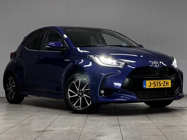 Toyota YARIS 1.5 Hybrid Dynamic/ NIEUW MODEL!/ Dealer Onderhouden!/ Trekhaak!/ Automaat/ LED Koplampen/ Apple+Android/ DAB+/ 16''LMV/ Grootlichtass./ Camera/ Clima/ Navi/ Cruise/ Bluetooth/ Multi.LEDER.Stuur/ Isofix/ Getint