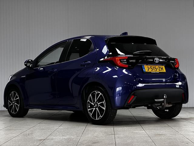 Toyota YARIS 1.5 Hybrid Dynamic/ NIEUW MODEL!/ Dealer Onderhouden!/ Trekhaak!/ Automaat/ LED Koplampen/ Apple+Android/ DAB+/ 16''LMV/ Grootlichtass./ Camera/ Clima/ Navi/ Cruise/ Bluetooth/ Multi.LEDER.Stuur/ Isofix/ Getint
