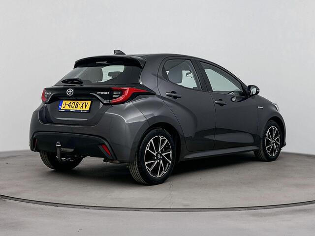 Toyota YARIS 1.5 Hybrid Dynamic Navigatie | Trekhaak | Apple Carplay | Android Auto | Ash Grey Metallic |