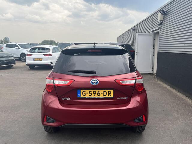 Toyota YARIS 1.5 Hybrid Bi-Tone Navigatie, Achteruitrijcamera, Privacy glass, LMV, Climate control, Onderhoudshistorie compleet