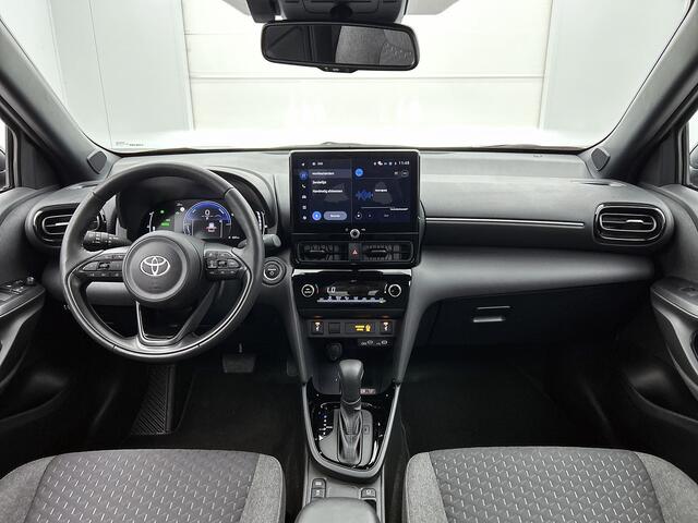 Toyota YARIS Cross 1.5 Hybrid 115 Dynamic Comfort Pack | BTW voertuig | Dodehoek detectie | Stuur+stoelverwarming | Parkeersensoren voor+Achter | Draadloze telefoonlader | Apple CarPlay/Android Auto | Cruise Control Adaptive | Achteruitrijcamera