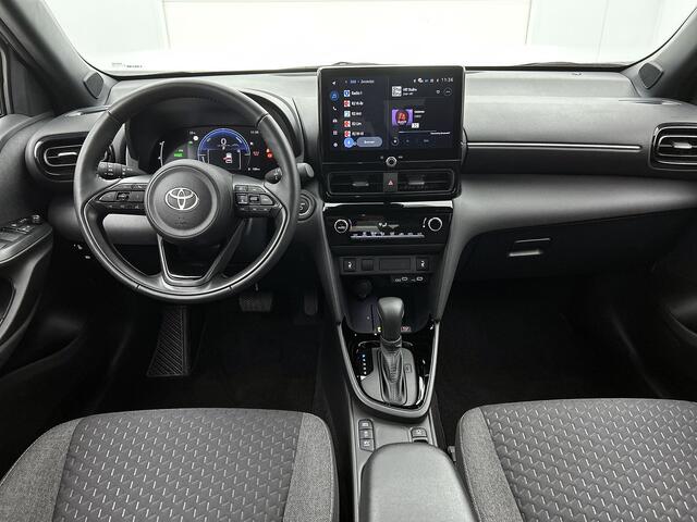 Toyota YARIS Cross 1.5 Hybrid 115 First Edition Comfort Pack | BTW voertuig | Dodehoek detectie | Stuur+stoelverwarming | Parkeersensoren voor+achter | Draadloze telefoonlader | Apple CarPlay/Android Auto | Cruise Control Adaptive |