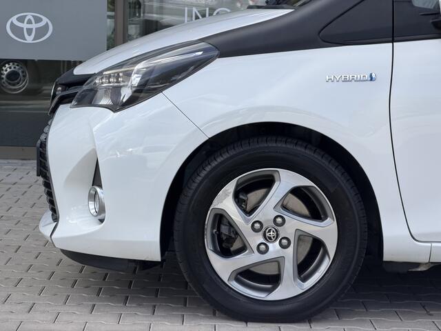 Toyota YARIS 1.5 Hybrid Trend Bi-Tone | Leer | Navigatie | LM Velgen