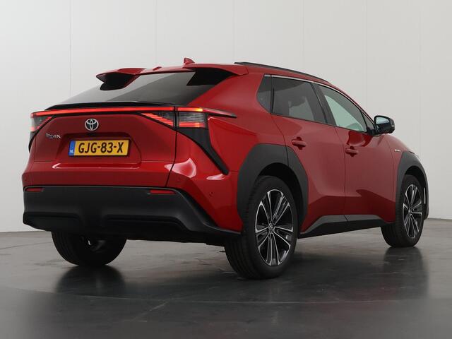 Toyota bZ4X Premium 71 kWh | SOH 98% | Navigatie | Lederen Interieur | Stoelverwarming/Koeling | Stuurverwarming | 360 Camera | DAB | Apple CarPlay/ Android Auto | Panoramadak | Adaptieve Cruise Control | Ele. verstelbare stoelen + geheugen | JBL Audio |