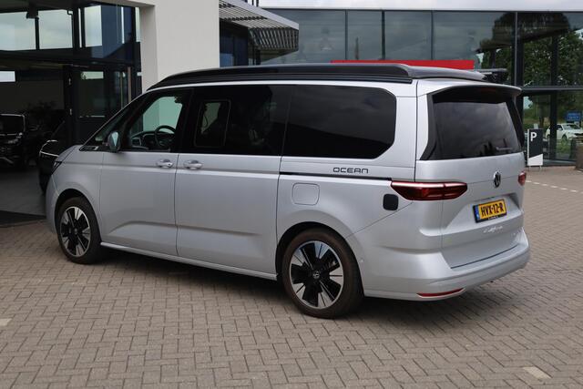 Volkswagen CALIFORNIA 180KW-245PK, Hybride, Camper, Standkachel, Keuken met Koelkast, gaspit, stromend water, 230V, elektrisch hef dak, Luifel, slaapmogelijkheid 2 persoon bed, 4 zitplaatsen, watertank, handdouche, vele opberg mogelijkheden,