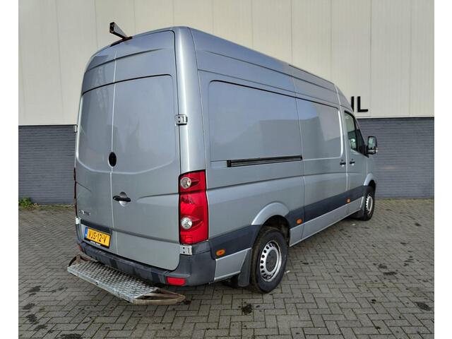 Volkswagen CRAFTER 50 2.0TDI L2H2 3 pers. Camera ECC Step-up Lat-om-lat Betonplex Schuifdeur ASR Elektr.Ramen+Spiegels+Centr.Vergr.+Afst.b. ABS ESP Airbag Blue motion Tussenwand GVW teruggekeurd