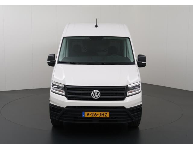 Volkswagen CRAFTER 35 2.0 TDI 140 PK Aut. | L3 H3 | Highline | Stoelverwarming | Parkeercamera | 3-Zits | Volledig Betimmerde Laadruimte | Apple Carplay - Android Auto | Airco | Cruise Control | LED Lampen |