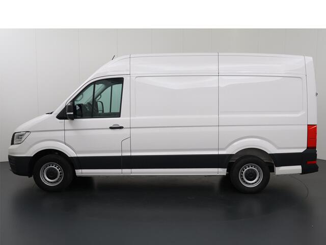 Volkswagen CRAFTER 35 2.0 TDI 140 PK Aut. | L3 H3 | Highline | Stoelverwarming | Parkeercamera | 3-Zits | Volledig Betimmerde Laadruimte | Apple Carplay - Android Auto | Airco | Cruise Control | LED Lampen |