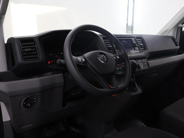 Volkswagen CRAFTER 35 2.0 TDI 140 PK Aut. | L3 H3 | Highline | Stoelverwarming | Parkeercamera | 3-Zits | Volledig Betimmerde Laadruimte | Apple Carplay - Android Auto | Airco | Cruise Control | LED Lampen |