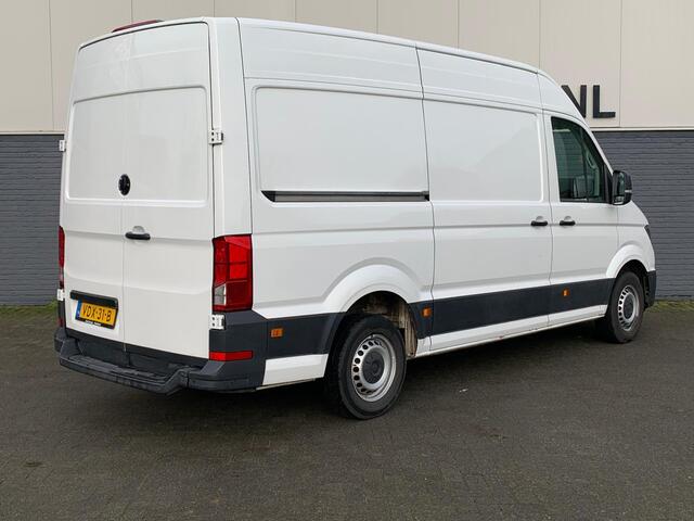 Volkswagen CRAFTER 30 2.0 TDI L3H2 3 Persoons Comfortline Airco Cruise-Control Navigatie Parkeerhulp v/a Licht-Regensensor Dab+ Bluetooth Verwarmbare voorruit+ruitensproeiers Betonplex Lat-om-Lat Betimmering Schuifdeur 1e Eigenaar Euro 6