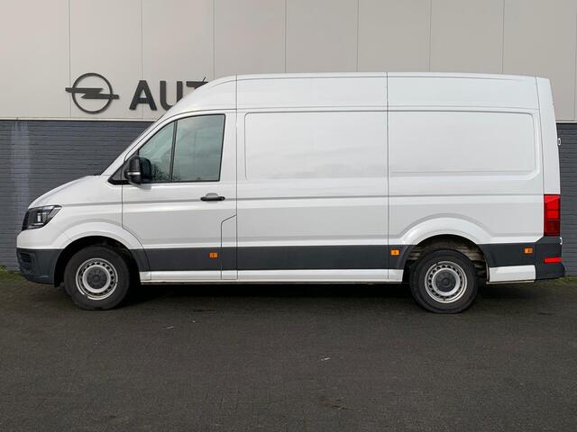 Volkswagen CRAFTER 30 2.0 TDI L3H2 3 Persoons Comfortline Airco Cruise-Control Navigatie Parkeerhulp v/a Licht-Regensensor Dab+ Bluetooth Verwarmbare voorruit+ruitensproeiers Betonplex Lat-om-Lat Betimmering Schuifdeur 1e Eigenaar Euro 6