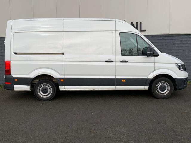 Volkswagen CRAFTER 30 2.0 TDI L3H2 3 Persoons Comfortline Airco Cruise-Control Navigatie Parkeerhulp v/a Licht-Regensensor Dab+ Bluetooth Verwarmbare voorruit+ruitensproeiers Betonplex Lat-om-Lat Betimmering Schuifdeur 1e Eigenaar Euro 6