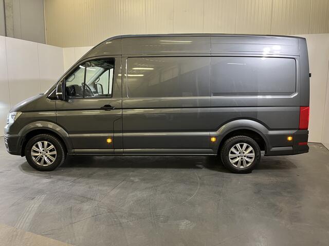 Volkswagen CRAFTER 35 2.0 TDI L3H3 Highline / AUTOMAAT/ GARANTIE TM 05-2028/ 140 PK/ TREKHAAK/ 3 PERSOONS/ CAMERA/ PARK. SENSOREN/ ERGO COMFORT/ LED/ PARK. ASSIST/ VOORRUIT VERWARM./ ADAPT. CRUISE/ APP CONNECT/ NAVI/ AIRCO/ DAB/ 17" LM