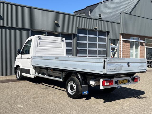 Volkswagen CRAFTER 35 2.0 TDI L4 Open laadbak Pick-up Airco Cruise controle 3-Persoons 1e eigenaar Dealer onderhouden p-up bakwagen Achterruitrijcamera Lederbekleding Werkverlichting