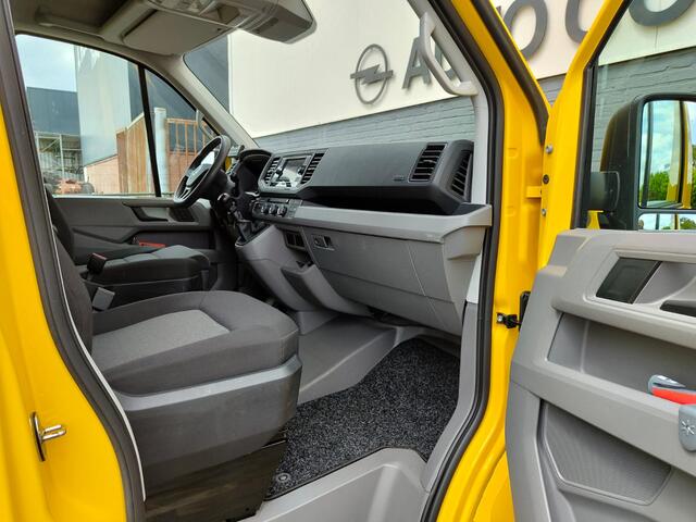 Volkswagen CRAFTER 35 2.0 TDI L3H3 Highline Airco Trekhaak Comfort Plus bestuurdersstoel Cruise Control Camera Pdc Bluetooth Voorruitverwarming Inbouwkasten Omvormer Signaleringsverlichting Betonplex Vloer Wandbetimmering Licht- en regensensor 3.000KG Trekgewicht 1e Eigenaa