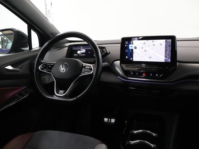 Volkswagen ID.4 First 77 kWh | SOH 94% | Elek. trekhaak | Warmtepomp | Stoel/stuurwielverwarming | Navigatie | Parkeercamera | Cruise Control Adaptief |