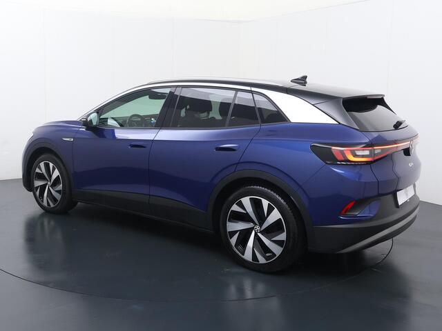 Volkswagen ID.4 First 77 kWh | 204 PK | SoH 87% | Navigatiesysteem | Adaptive cruise control | Verwarmde voorstoelen + voorruit | 20" LM velgen |