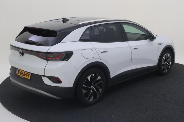 Volkswagen ID.4 Tech 77 kWh / Warmte pomp / Memory seat / Navigatie / 360 Camera / Pano / Lichtmetaal 19 inch /
