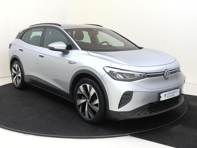 Volkswagen ID.4 Life 77 kWh | Navigatie | Adaptieve cruise control | Stoelverwarming | Parkeersensoren | CarPlay | Elektrisch inklapbare buitenspiegels | Voorklimatisering |