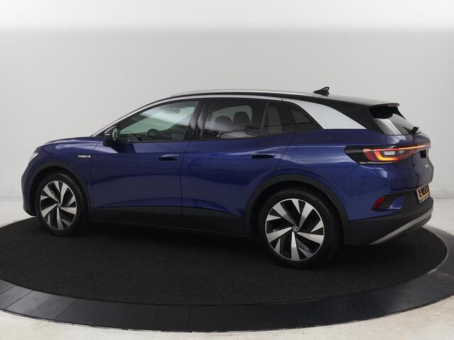 Volkswagen ID.4 First 77 kWh | Stoel & stuurverwarming | Camera | Carplay | Adaptive cruise | Half leder | 20'' | Navigatie | DAB | Sfeerverlichting