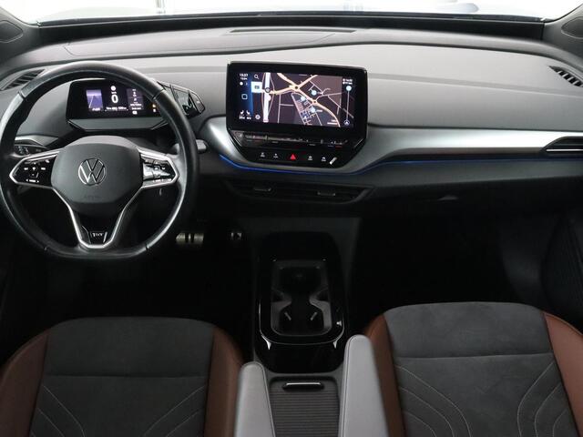 Volkswagen ID.4 First 77 kWh | Stoel & stuurverwarming | Camera | Carplay | Adaptive cruise | Half leder | 20'' | Navigatie | DAB | Sfeerverlichting