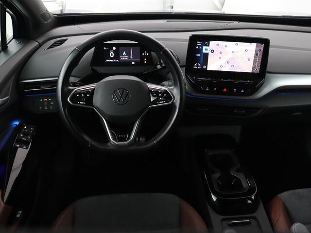 Volkswagen ID.4 First 77 kWh | Trekhaak | Stoel & stuurverwarming | Adaptive cruise | Camera | Carplay | Half leder | Navigatie | 20'' | Full LED | Keyless | Climate control | Sfeerverlichting
