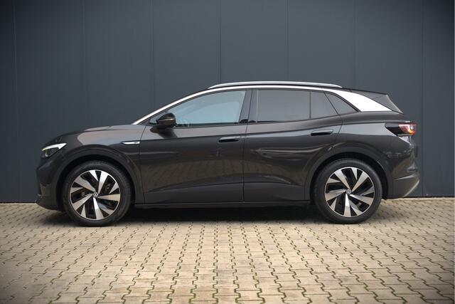 Volkswagen ID.4 First 77 kWh | Stoelverwarming | Stuurverwarming | Trekhaak | Adaptive Cruise Control | Navigatie | Apple Carplay | Keyless | Camera | Parkersensoren |