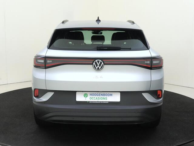 Volkswagen ID.4 Pro Business 77 kWh | SoH 93% | Parkeerassistent | Luxe bekleding | Adaptieve cruise control | Achteruitrijcamera | Navigatie | Stoelverwarming | CarPlay |