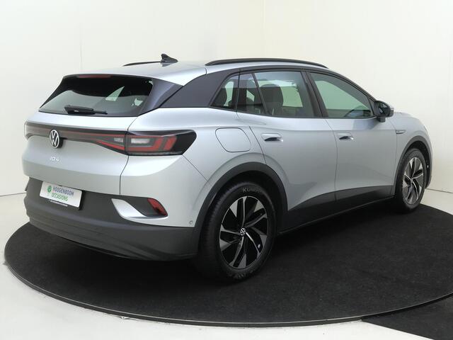 Volkswagen ID.4 Pro Business 77 kWh | SoH 93% | Parkeerassistent | Luxe bekleding | Adaptieve cruise control | Achteruitrijcamera | Navigatie | Stoelverwarming | CarPlay |