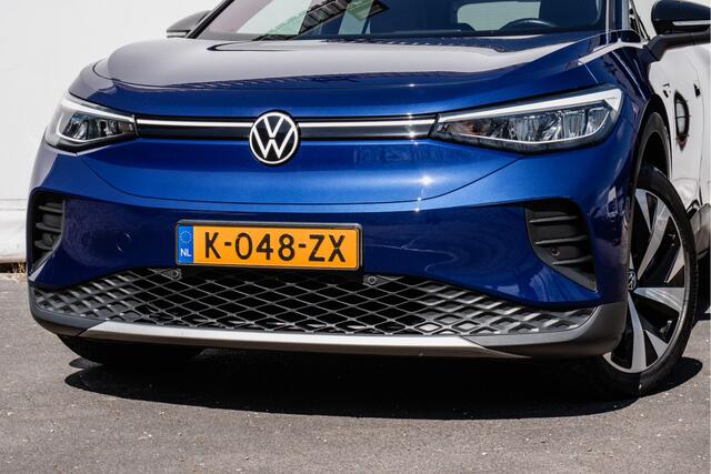 Volkswagen ID.4 First Pro 77 kWh SOH 89% Trekhaak/ Stoel-stuurverwarming/ Camera/ Navigatie/ Carplay/ Sfeerverlichting/ Full led/ 20" Lmv
