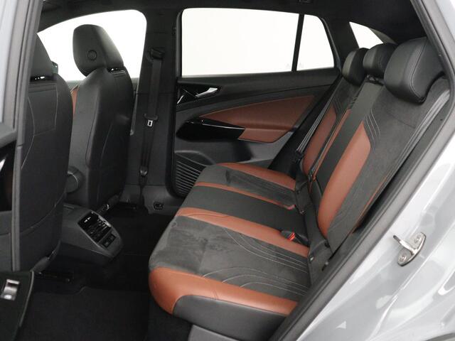 Volkswagen ID.4 Tech 77 kWh | SOH 92,2% | Panorama | 360 Camera | Head up | Virtual cockpit | Sfeerverlichting | Stoel/Stuurverwarming | Adaptive cruise | Carplay | Traffic assist | Climate control | Half leder/velours