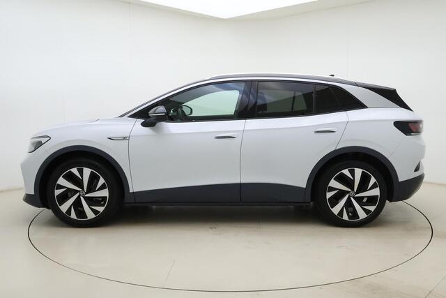 Volkswagen ID.4 First 77 kWh | Apple carplay/Android auto | Automatische airco | Navigatie | Cruise control adaptief | Trekhaak | Licht metalen velgen 20''|