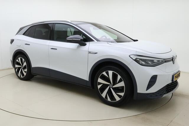Volkswagen ID.4 First 77 kWh | Apple carplay/Android auto | Automatische airco | Navigatie | Cruise control adaptief | Trekhaak | Licht metalen velgen 20''|
