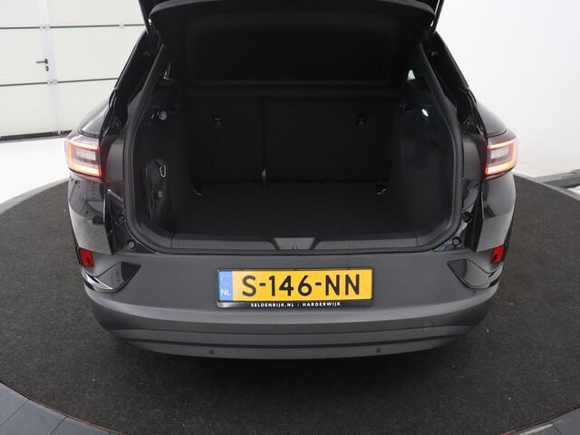 Volkswagen ID.4 Pro 77 kWh | SOH 95,4% | Adaptive cruise | Lane assist | Stuur/stoelverwarming | Climate control | Sfeerverlichting | Caplay | Park assist | 20" velgen