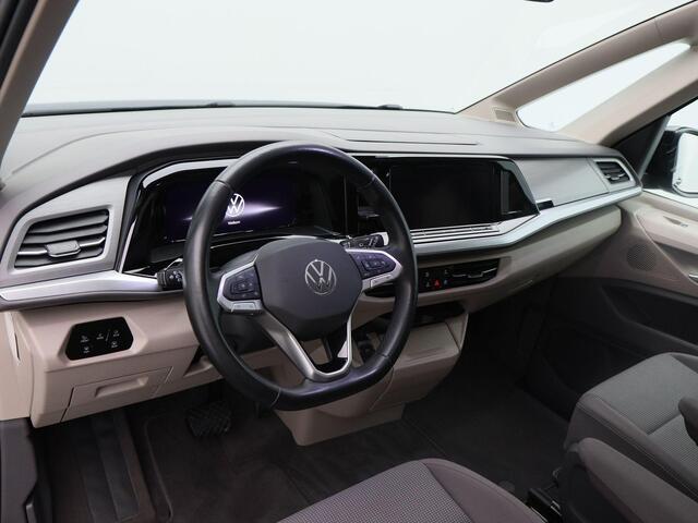 Volkswagen MULTIVAN 1.4 218 Pk Automaat eHybrid L2H1 Style | 7 Persoons | Adaptive Cruise | CarPlay | Camera | Panoramadak | Stoelverwarming | Trekhaak | 23.392 Km!!