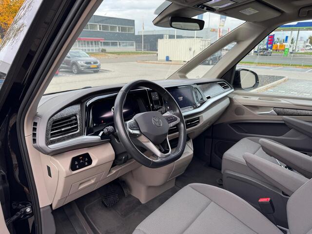 Volkswagen MULTIVAN 1.4 eHybrid 218 Pk Automaat 6-Persoons | Elektrische schuifdeur | Trekhaak | Panoramadak | LED | Adaptive Cruise | Camera | Carplay | 18 Inch | 64.949 Km!!