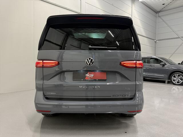 Volkswagen MULTIVAN 1.4 eHybrid EDITION 7p. PURE-GREY/PANO/EL.TREKHAAK/ACC/CAMERA/IQ-LIGHT/SFEER/CARPLAY/NAVI/EL.SCHUIFDEUREN/18"BLACK/PARK-ASSIST/UNIEKE AUTO, KLEUR PURE-GREY MET ZWART DAK/EDITION UITVOERING
