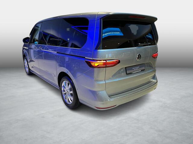 Volkswagen MULTIVAN Bedrijfswagens Bulli L2 1.5 Ehybrid 180kW 245 pk DSG 4 motion | Versterkte kunststof vloerbedekking in houtlook | Multifunctionele verschuifbare tafel in passagiersruimte | Navigatiesysteem '' Discover Pro'' | Privacy Plus glas (90%) vanaf B-stijl |