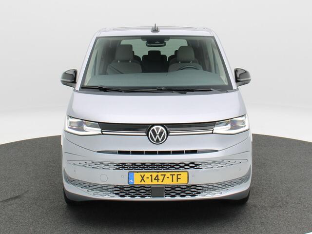 Volkswagen MULTIVAN 1.4 eHybrid 218 Pk Automaat L2H1 Style 7 Persoons | Panorama dak | Trekhaak | Stoelverwarming | Camera | CarPlay | Navigatie | 17 Inch | 19.071 Km !!