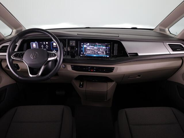 Volkswagen MULTIVAN 1.5 eHybrid L2 Economy Business 4Motion | 7 Zits | Zwenkbare Trekhaak | Navigatie | Achteruitrij Camera | Parkeer hulp | 65% getinte ruiten achter |