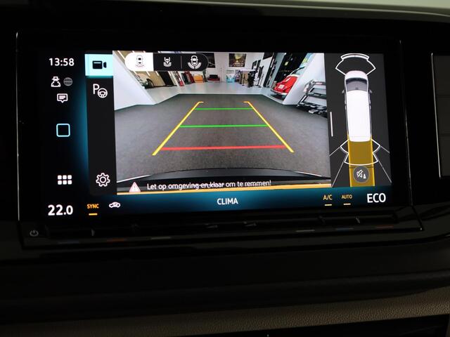 Volkswagen MULTIVAN 1.5 eHybrid L2 Economy Business 4Motion | 7 Zits | Zwenkbare Trekhaak | Navigatie | Achteruitrij Camera | Parkeer hulp | 65% getinte ruiten achter |
