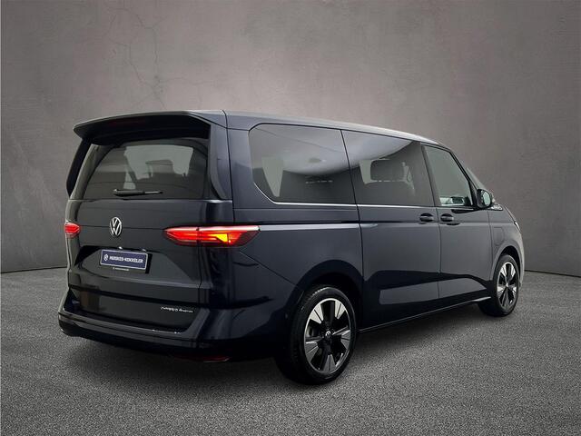 Volkswagen MULTIVAN 1.5 eHybrid L2 Bulli Edition 4Motion | Prijs is INCL. BTW/BPM !| 7 zits via-a-vis zitopstelling | Elec. schuifdeuren & achterklep | Trekhaak | 19" | TravelAssist | Verwarmd stuur & stoelen