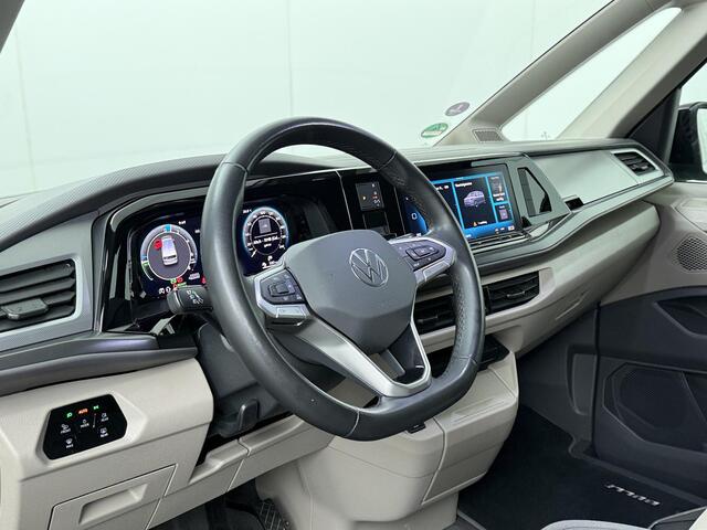Volkswagen MULTIVAN Bedrijfswagens 1.5 eHybrid L2 Economy Business 4Motion | 245 PK | Trekhaak wegklapbaar | 7-Persoons | Cruise control | Climate control | LED verlichting | Parkeersensoren | Digital Cockpit | Apple Carplay / Android Auto |