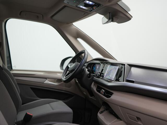 Volkswagen MULTIVAN 1.4 eHybrid Bulli 7 Zits PHEV 218pk Dealer O.H | Trekhaak Af Fabriek | Adaptive Cruise | Camera | Sportstoelen & Stuur Verwarmd | Apple Carplay | BLIS | Navigatie | Virtual | DAB | 17"L.M | Plug In Hybrid |