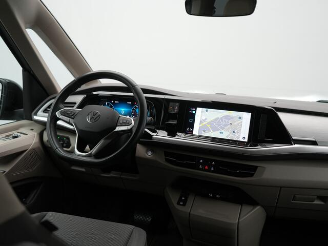 Volkswagen MULTIVAN 1.4 eHybrid Bulli 7 Zits PHEV 218pk Dealer O.H | Trekhaak Af Fabriek | Adaptive Cruise | Camera | Sportstoelen & Stuur Verwarmd | Apple Carplay | BLIS | Navigatie | Virtual | DAB | 17"L.M | Plug In Hybrid |