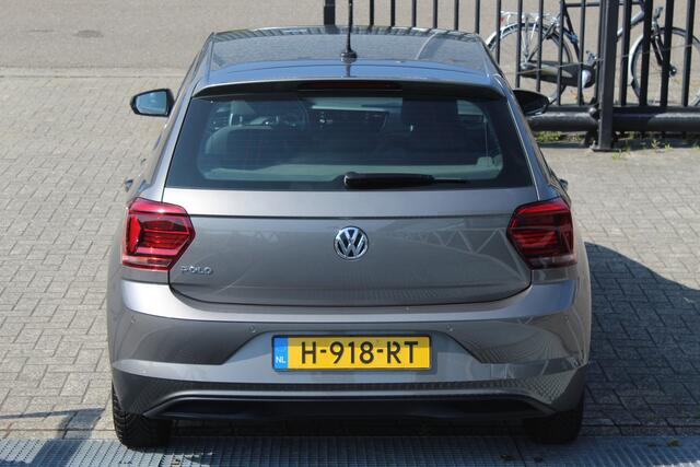 Volkswagen POLO 1.0 TSI Comfortline Business AUTOMAAT/Navigatie/Parkeersensoren rondom/Adaptive cruise control/Apple carplay/Airco/Bluetooth/Multifunctioneel stuurwiel/Spraakbediening/Elektrische ramen/Elektrisch verstelbare spiegels.