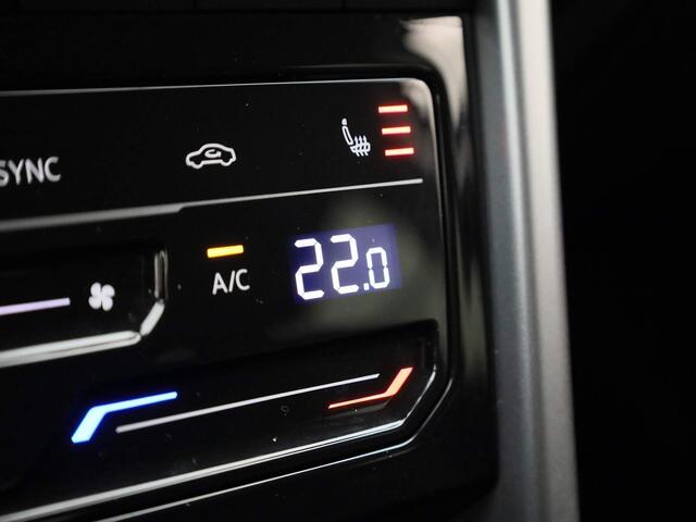 Volkswagen T-Roc 1.5TSI/150PK Life DSG · Navigatie · Stoelverwarming · Parkeersensoren · Garantie tot maart 2026