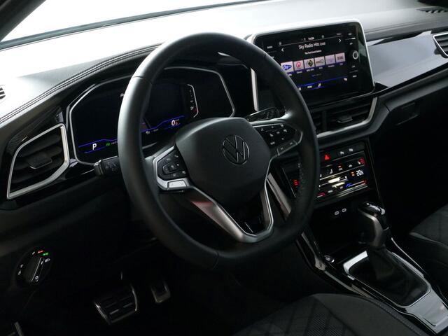Volkswagen T-Roc 1.5 TSI 150PK R-LINE EVO IQ LIGHT ALCANTARA ELEK.KLEP CARPLAY STOEL/STUUR VERW. 18"LMV VIR.COCKPIT 10/2024 Ascotgrau 70 BIJNA NIEUWE VOLKSWAGEN'S UIT VOORRAAD LEVERBAAR